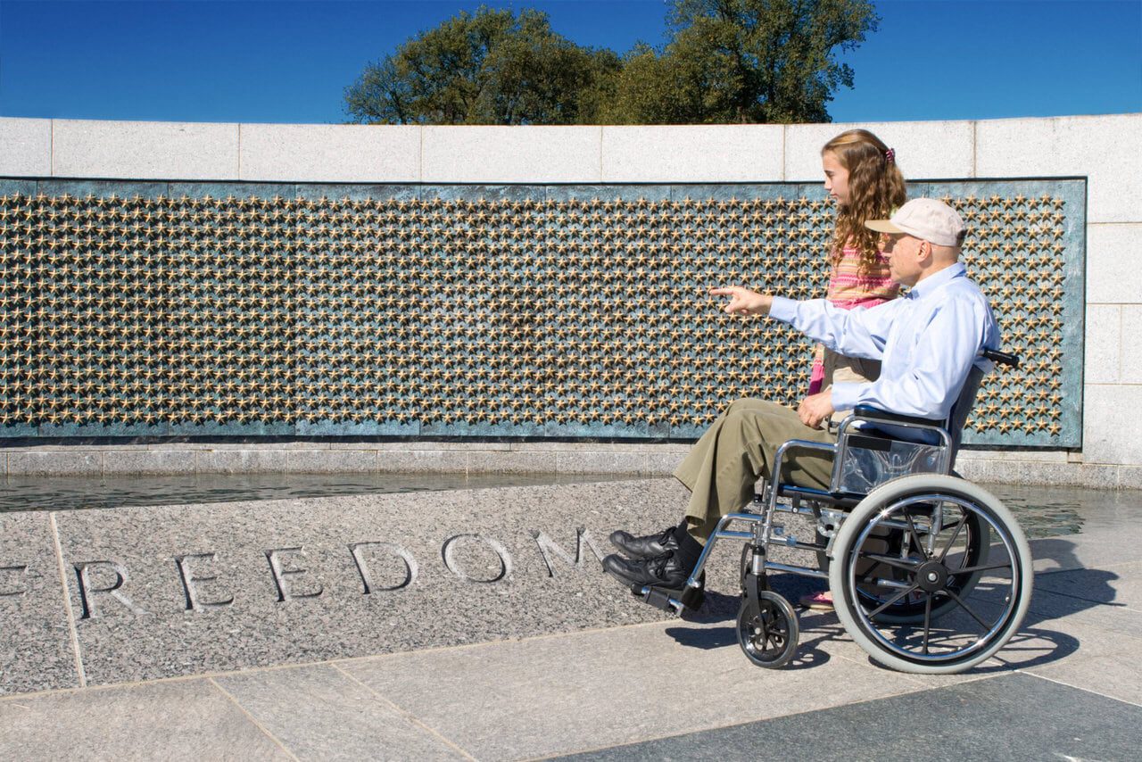 Share Your Story: Grandfather in Wheelchair and Granddaughter at World War II Memorial